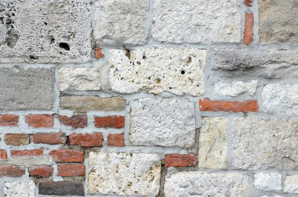 Full frame background a wall of stones and bricks — Stock Photo, Image