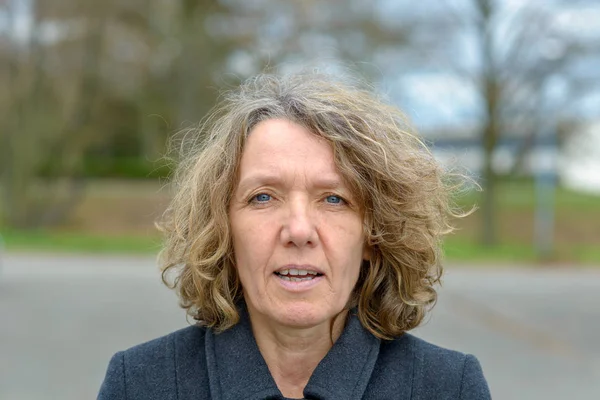 Middle aged woman front portrait with open mouth — Stock Photo, Image