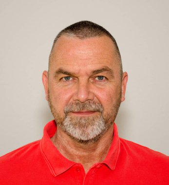 Friendly bearded man with a quiet smile