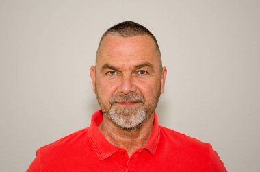 Friendly bearded man with a quiet smile