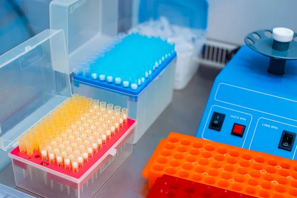 Laboratory equipment for DNA testing and blood analysis.