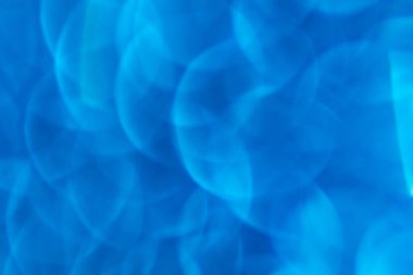 Su mavisi soyut arkaplan. Doku bokeh. Odaklanmamış resim.