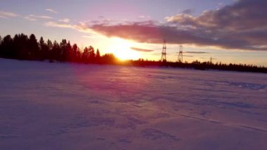 Güneşe kar üstünde