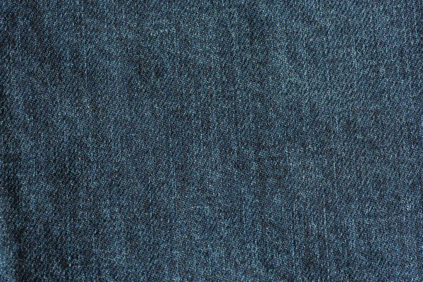 Denim jeans doku arka plan. Mavi pamuklu kumaş dokusuna. Kumaş yapısı.