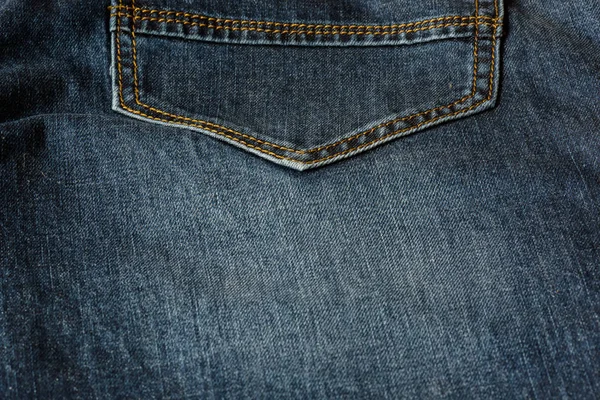 Primer Plano Trozo Jeans Azules Con Puntadas Naranjas Primer Plano —  Fotos de Stock