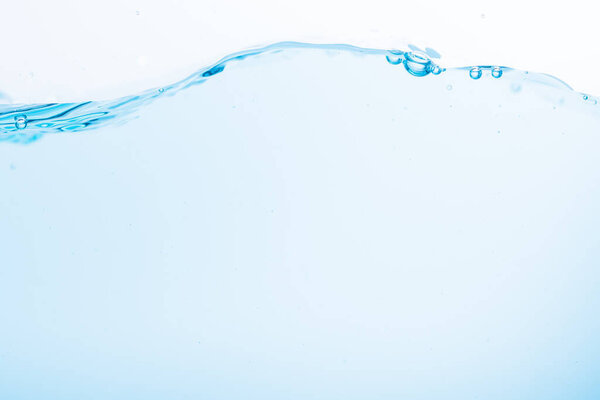 Surface of the blue water waves splash on a white background