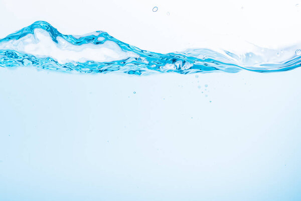 Surface of the blue water waves splash on a white background