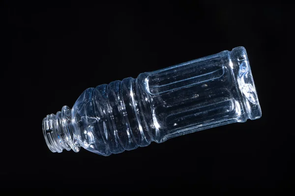 Plastic bottles, white garbage, clear, black background