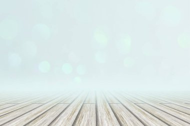 Beyaz ahşap zemin mavi bokeh arka plan