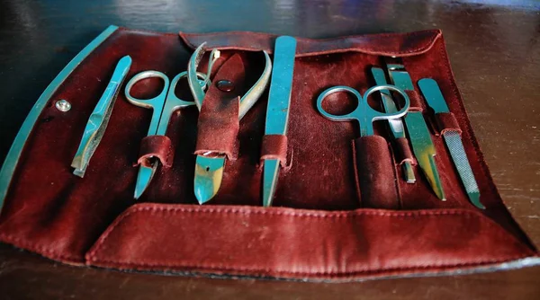 Leather manicure set in red color to take with you when travelling — Stock Photo, Image