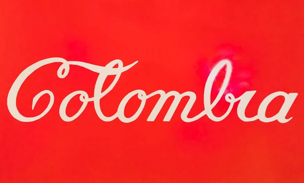 Bílý nápis na červeném pozadí Kolumbie — Stock fotografie