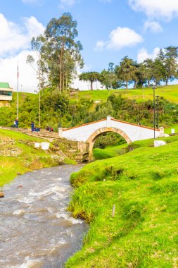Tunja Colombia Boyaca bridge and river in a sunny day clipart