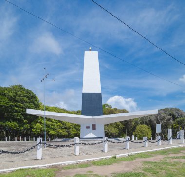 Joao Pessoa - PB, Brazil - February 25, 2019: Triangular shape lighthouse known as Farol do Cabo Branco (white cable lighthouse). Monument designed by the architect Pedro Abraao Dieb. clipart