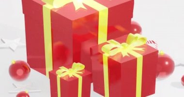 Noel hediye kutusu animasyonu ve yanında yazı için boş alan. Xmas animasyon arka plan, kar yağıyor, kırmızı kutular, parlak altın kurdele, kırmızı toplar, Noel bastonu ve yıldız süslemeleri. 3B görüntüleme