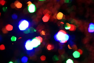 Yanıp sönen ampullerle soyut, bulanık arkaplan. Tatil konsepti. Yeni Yıl ve Noel