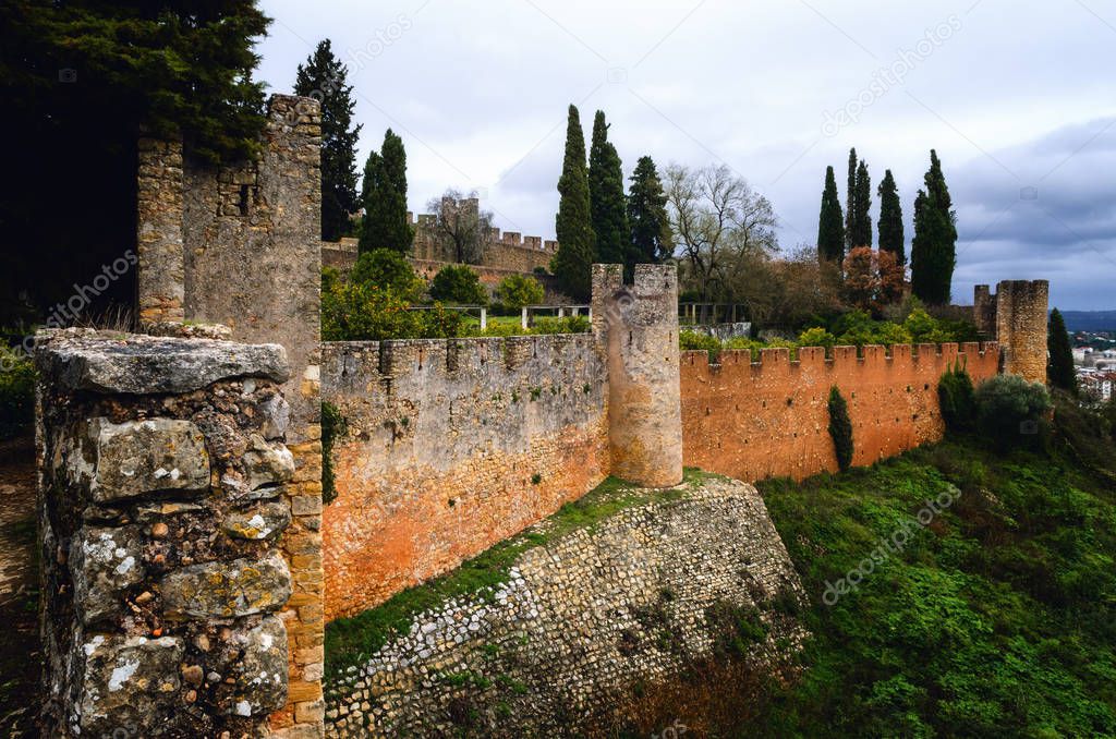 Outside stone walls of the convent of christ in Tomar, Portugal