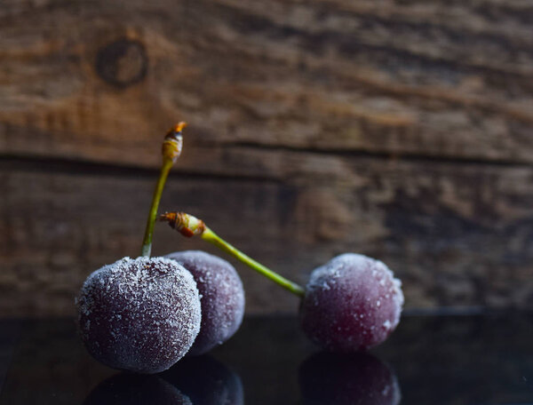 ripe cherry covered with frost