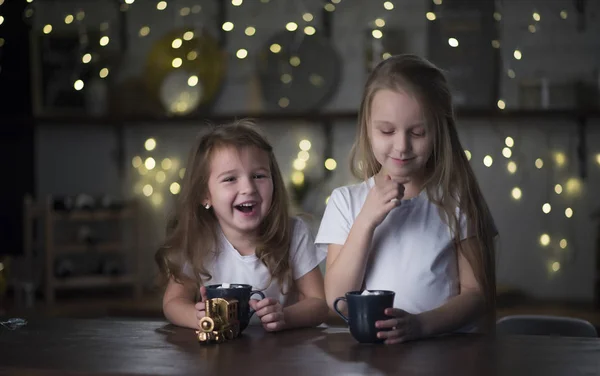 children drink tea with marshmallow marshmallows