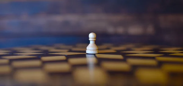 wooden chess set on chess Board