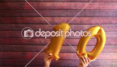 Kutlu olsun onuncu, ahşap zemin, yıldönümü kutlamaları üzerine on numara ile altın hava balonları