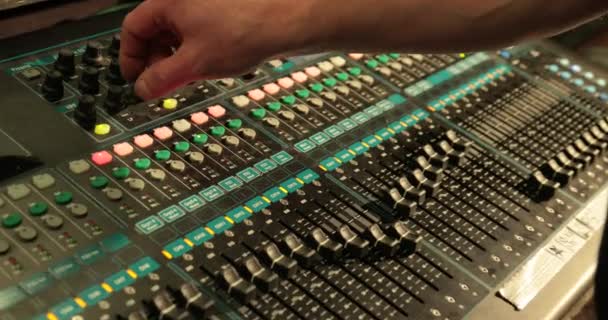 Close-Up Hands Of Sound Engineer Work With Faders On Mixer — Stock Video