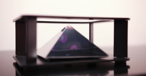 The Smartphone Designs A Hologram Of Digital Spiral For A Special Prism That Is On A Hologram Table. Prores 4k — Stock Video