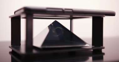 Akıllı telefon lazer çemberinde hologram gösterisi. Pembe arka planda gelecek teknoloji mobil holografik ekran. 4k ProRes