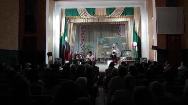 Performance in theater. on small stage are actors, women in national costumes — Stock Video