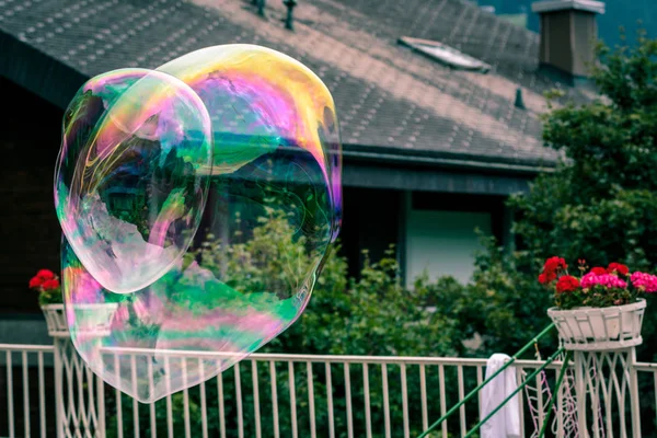 Big Rainbow Soap Bubbles Flyining Air Garden Background — Stock Photo, Image