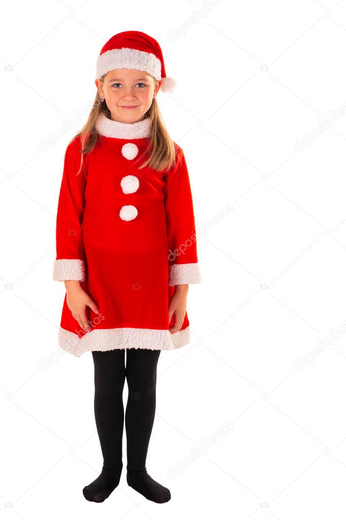 full length portrait of beautiful 8 year old girl standing with arms next to body wearing red christmas costume with a red dress, Santa Claus hat and black stockings isolated on white