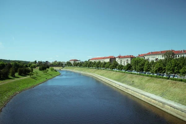 Summer town - green park, red roofs