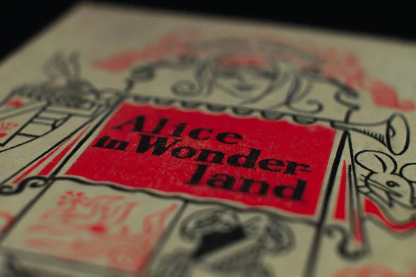Alice in Wonderland σκληρό εξώφυλλο με σχέδια Royalty Free Εικόνες Αρχείου