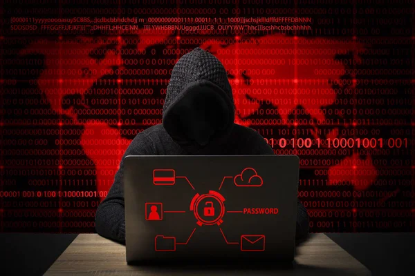 Hacker Berjaket Berkerudung Dengan Laptop Duduk Meja Menambahkan Ikon Pencurian — Stok Foto
