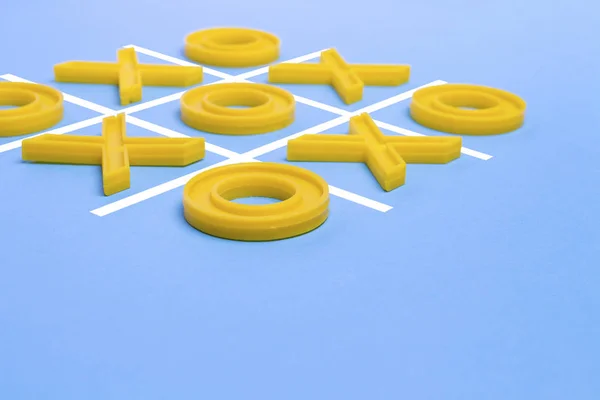 Yellow Plastic Crosses Toe Ruled Field Playing Tic Tac Toe — Stock Photo, Image