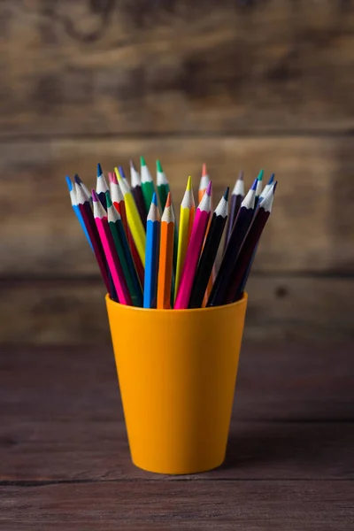 Color Pencils Drawing Orange Glass Wooden Background — Stock Photo, Image