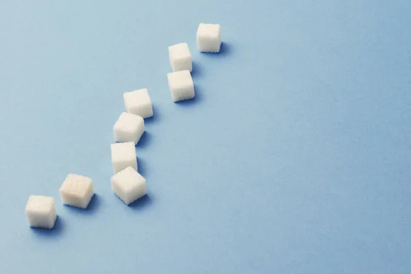 Cubos Azúcar Sobre Fondo Azul Concepto Azúcar Mata Daña Cuerpo —  Fotos de Stock