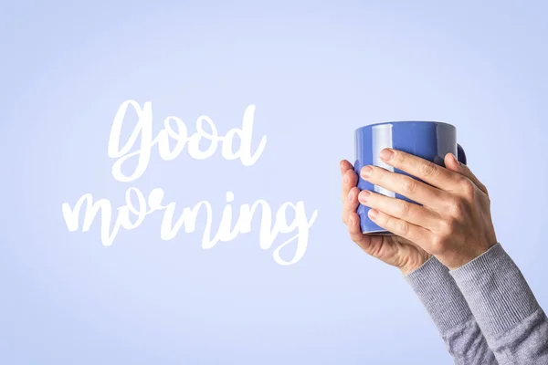 Female Hand Holding Blue Cup Hot Coffee Tea Blue Background — Stock Photo, Image