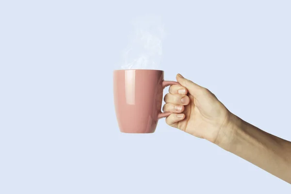 Female Hand Holding Pink Cup Hot Coffee Blue Background Side — Stock Photo, Image