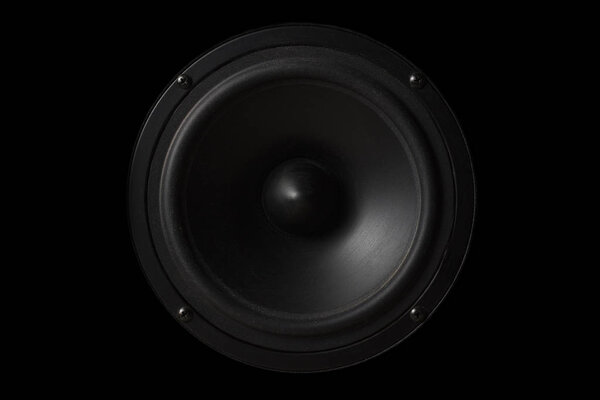 Black Music speaker on a black isolated background. Party or music listening concept