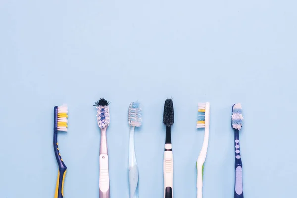 Several Different Used Toothbrushes Blue Background Toothbrush Change Concept Oral — Stock Photo, Image