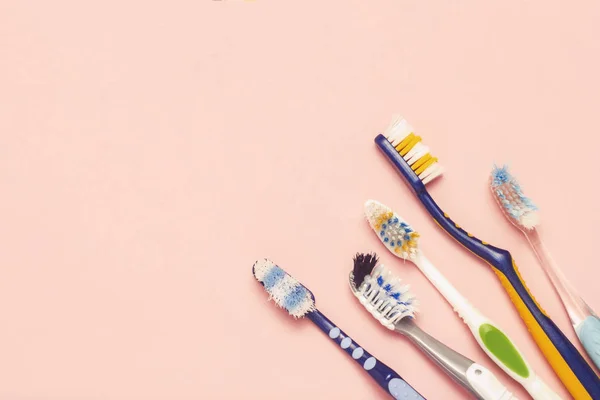 Several Different Used Toothbrushes Pink Background Toothbrush Change Concept Oral — Stock Photo, Image