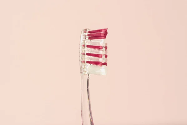 Neue Zahnbürste Auf Rosa Hintergrund Das Konzept Der Zahnbürstenwechsel Mundhygiene — Stockfoto