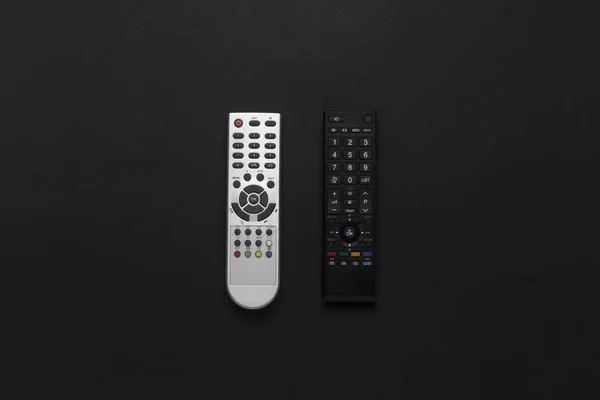 Grijze Zwarte Afstandsbedieningen Een Zwarte Achtergrond Het Concept Van Televisie — Stockfoto