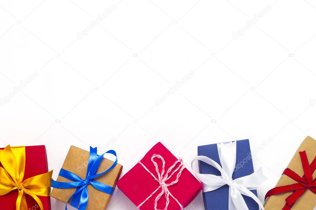 Many gift boxes on a white background. The concept of the holiday, gifts for anyone and relatives, New Year, Christmas, Birthday. Flat lay, top view