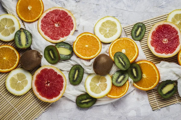 Fresh Tropical Fruits Grapefruit Lemon Orange Kiwi Light Stone Background — Stock Photo, Image