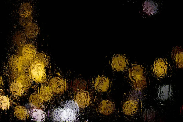 Bokeh Noite Luzes Cidade Atrás Vidro Molhado Durante Chuva Pode — Fotografia de Stock