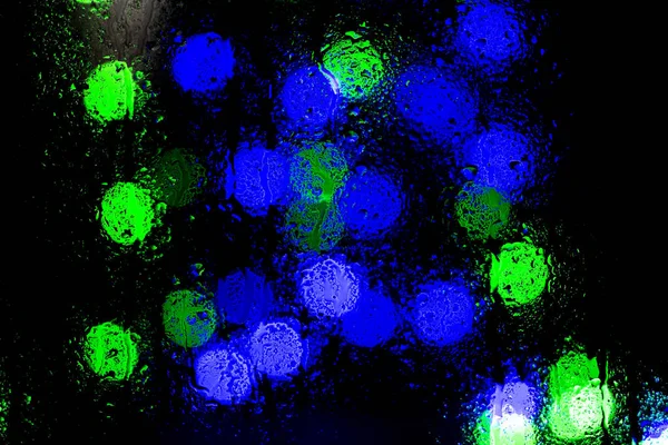 Bokeh Nacht Stadt Lichter Hinter Nassem Glas Bei Regen Kann — Stockfoto