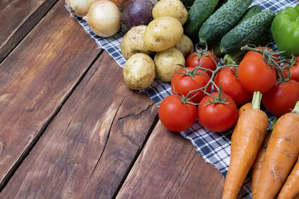 Fresh organic farm vegetables, Health care, on a wooden background. Harvest. Country style. Concept of a farm fair. Copy space Royalty Free Stock Photos