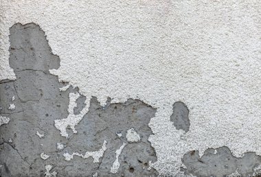 Çatlaklar, gözenekleri, çukurlar ve ufalanan dekoratif sıva ile Antik beton gri duvar. Trendy modern doku arka plan.