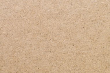 Fiberboard çarşafın ahşap yüzeyinde düz bir üst görünüm yatıyordu. Modern soyut moda dokusu arkaplanı